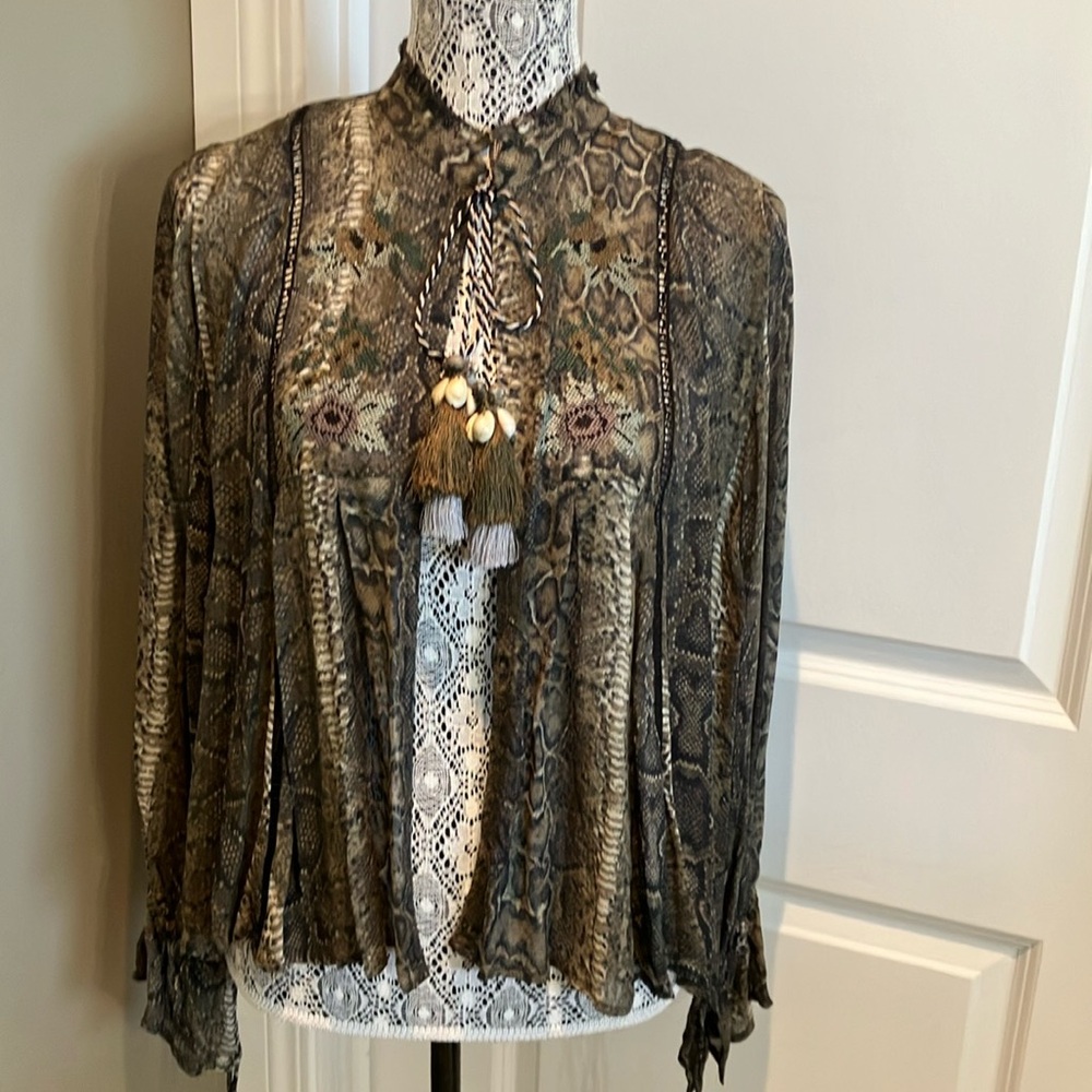 Fabulous Zara extra small animal print top.
